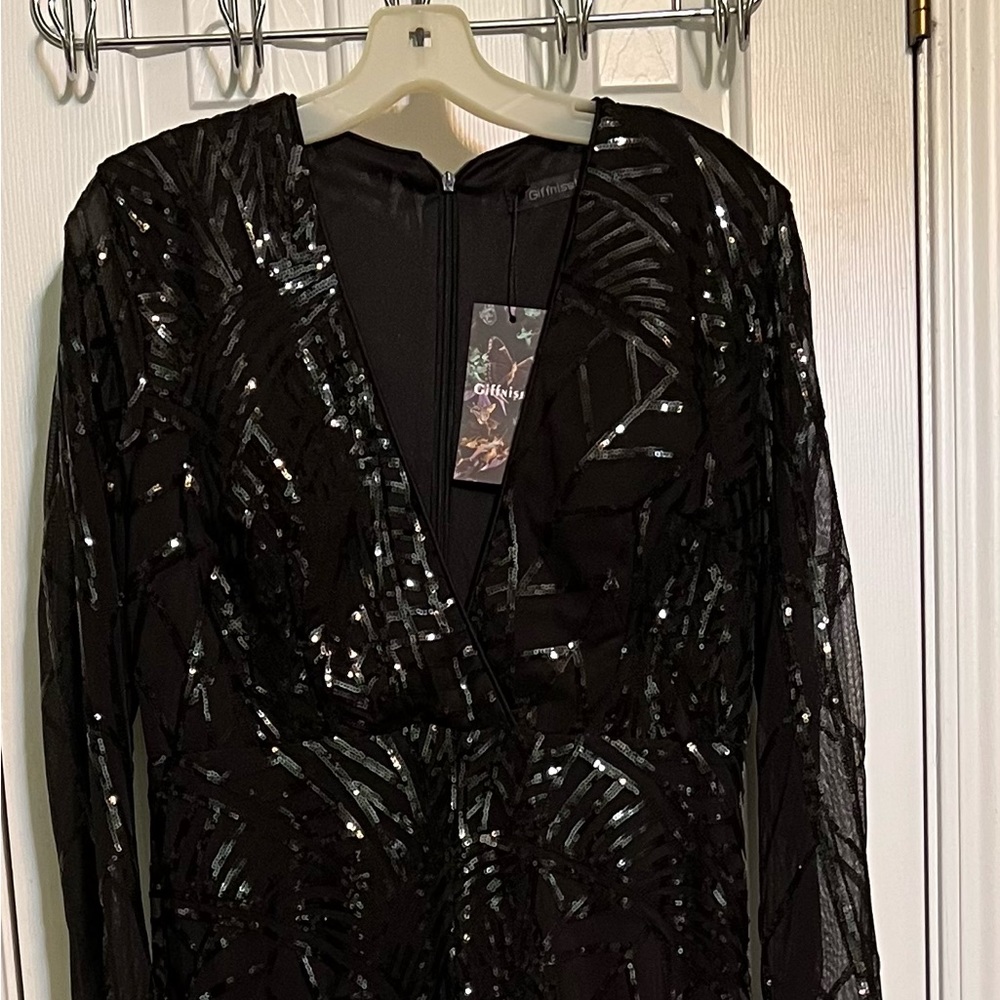 Giffniseti Black formal long dress in a large. Brand new